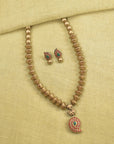 Paisleyara - Handmade Terracotta Statement Necklace Set – Antique Gold Beads with Paisley Pendant in Red Green Matching Earrings